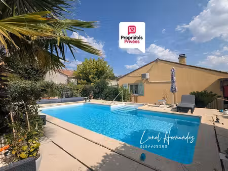 maison individuelle de plain-pied avec piscine et terrain clos de 558m²