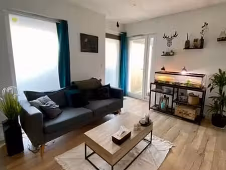 appartement avec cave  place de parking et extérieur privé