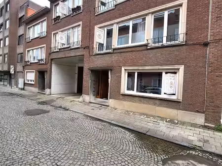 verkocht : opbrengsteigendom bestaande uit 5 appartementen.