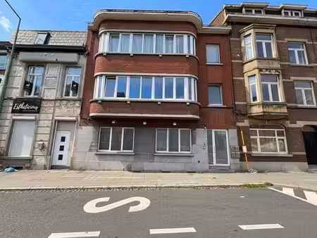immeuble composé de 3 appartements avec garages !