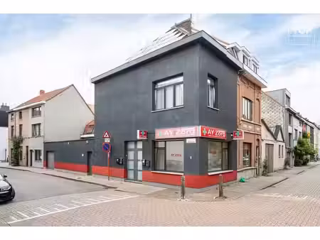 opbrengsteigendom met polyvalente ruimte + 2slpk appartement