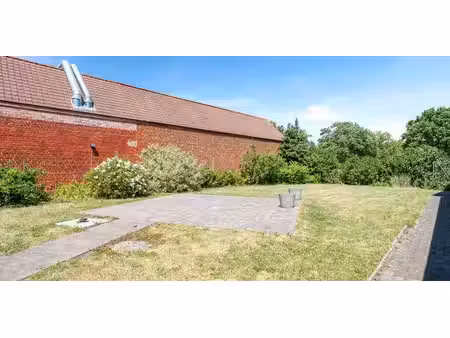 maison avec garage  prairie et jardin ensoleillé à melden