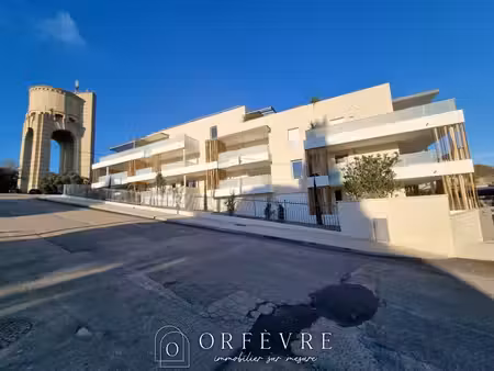 appartement rdc 2 pièce(s) 45.40 m2 avec terrasse et parking