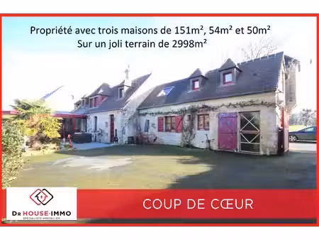 propriété avec trois maisons  sur un joli terrain de 2998m²