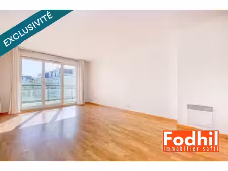 appartement 3 pièces de 63 m²- au 2éme étage avec ascenseur- balcon- box et cave.