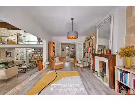appartement traversant à l'âme de pierre au coeur de l'écusson