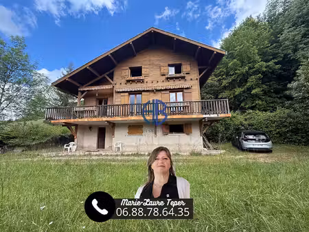 chalet de 113 m2 + sous-sol sur 7500m2 de terrain.