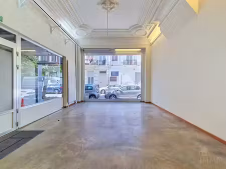 rdc commercial avec dépôt et atelier de 335 m²