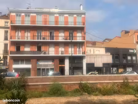 t4 face castillet petit immeuble 130 m2