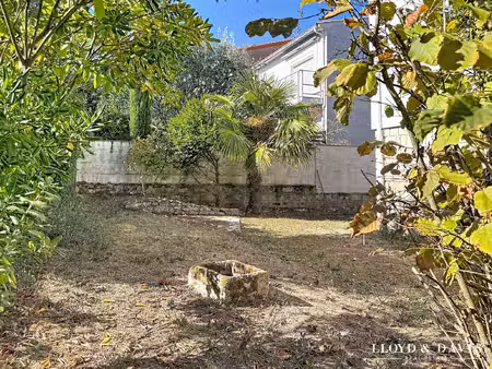 royan centre : maison année 50 de 88 m² avec garage et jardin