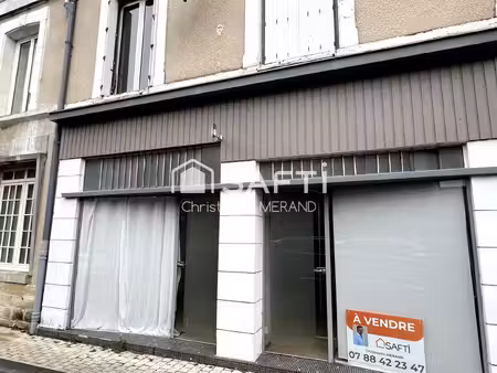 dans le centre de la commune immeuble locatif