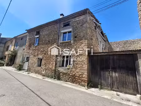 maison avec beau potentiel au calme