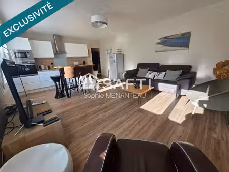 grand appartement 3 chambres avec garage et cave.