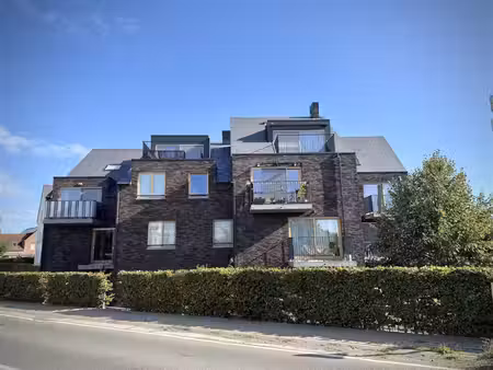 recent  instapklaar appartement met 2 slaapkamers  terras & overdekte autostaanplaats