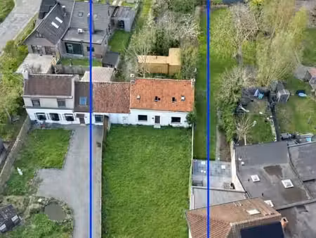 melle - bouwgrond met vergunde plannen  centraal gelegen ...