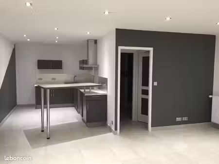 f2  très design  état neuf  64m²  plus annexes : coin rangement et cave