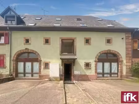 ensemble immobilier de 5 appartements - 4 garages - terrain de 900 m²