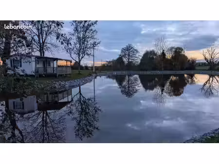 terrain de loisirs 8500 m² + étang de pêche refait à neuf + mobil-home