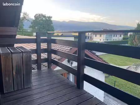 t2 proche frontière et commerces. vue jura/alpes  terrasse  parking