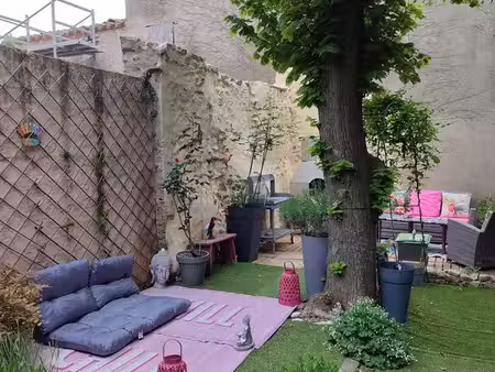 maison avec jardin... juste en face