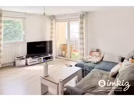 appartement 3 pièces de 63m2  balcon  2 parkings
