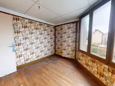 lot complet de 1 commerce et de 2 appartements caves et jardins