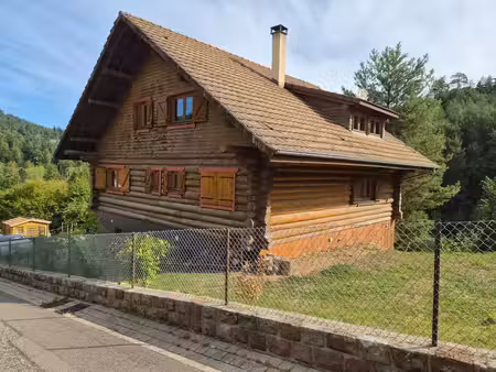 exclusivité – authentique maison en rondins massifs avec terrain clos de 37 ares a vangenb