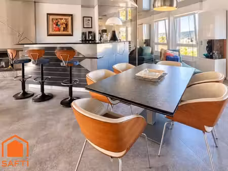 superbe appartement avec terrasses  2 caves et garage
