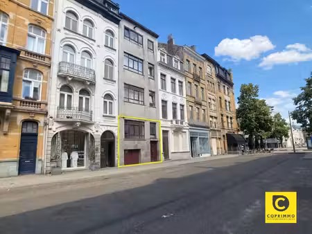 te renoveren souterrain met stadskoer  achterhuis en garage op 't zuid!