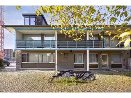 te koop: gerenoveerd appartement met 2 slaapkamers  terras en garage te heusden!