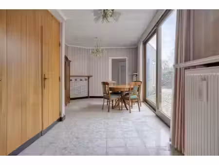 te renoveren woning gelegen aan het plein in kaprijke !
