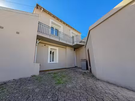 immeuble composé de 2 lots avec terrasse et garage