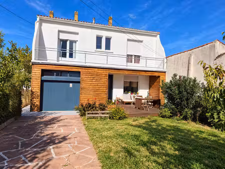 maison individuelle avec jardin et garage proche centre-ville