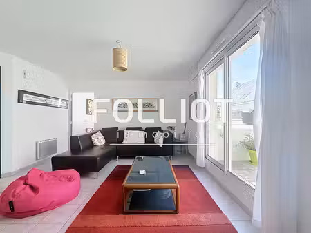 a vendre appartement à carteret ? élégant duplex avec terrasse à deux pas des commerces!