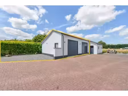 garage double + emplacement parki- 63m³ - portes electriques