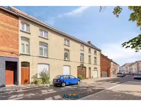 opbrengsteigendom met 2 woningen  loods en garage in gent
