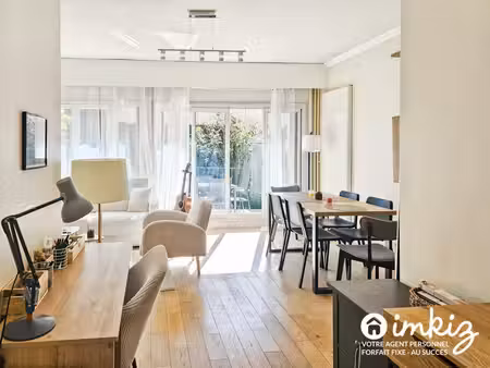 2 pièces traversant – terrasse & jardinet –parking