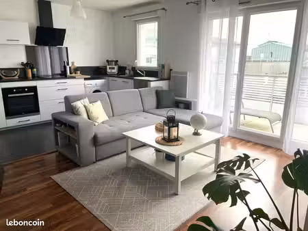 appartement 3 pièces  65m² (+ 14m² de balcon) en plein cœur de bourg