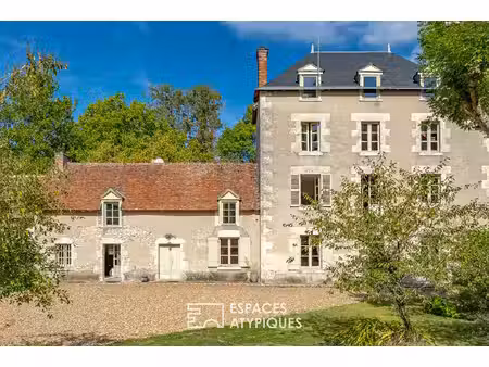 ancien moulin de caractère dans un écrin de verdure