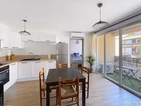 appartement t2 entièrement rénové avec garage fermé et parking