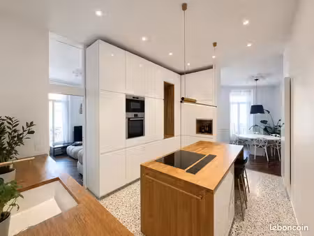 appartement de caractère rénové – 133 m² – 4 chambres – balcon – ascenseur