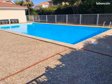pau nord – t2 lumineux avec balcon  parking privé et piscine