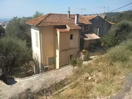 maison individuelle de 170 m² / immeuble