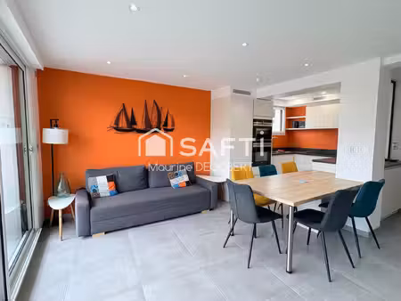 appartement de standing 2 chambres à 50m de la plage avec garage + place de stationnement