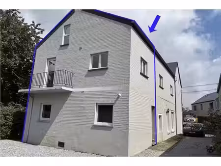 triplex 3 ch  avec jardin commun.
