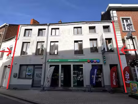 immeuble composé d’un espace commercial et d’un appartement
