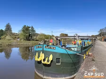 péniche habitable 175 m² – cadre unique au bord de l’eau