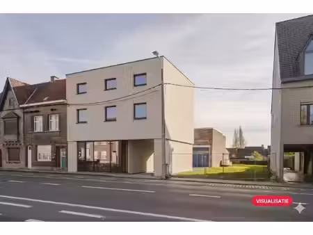 opbrengsteigendom met handelspand en 2 appartementen te koop in wevelgem