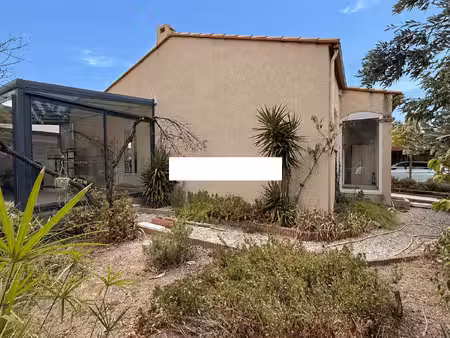 maison 4 faces de plain-pied avec jardin  véranda et panneau