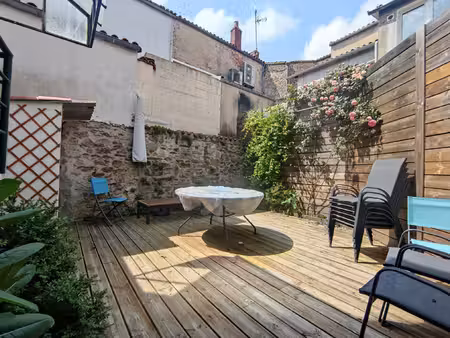 meublé hyper-centre avec garage et double terrasses